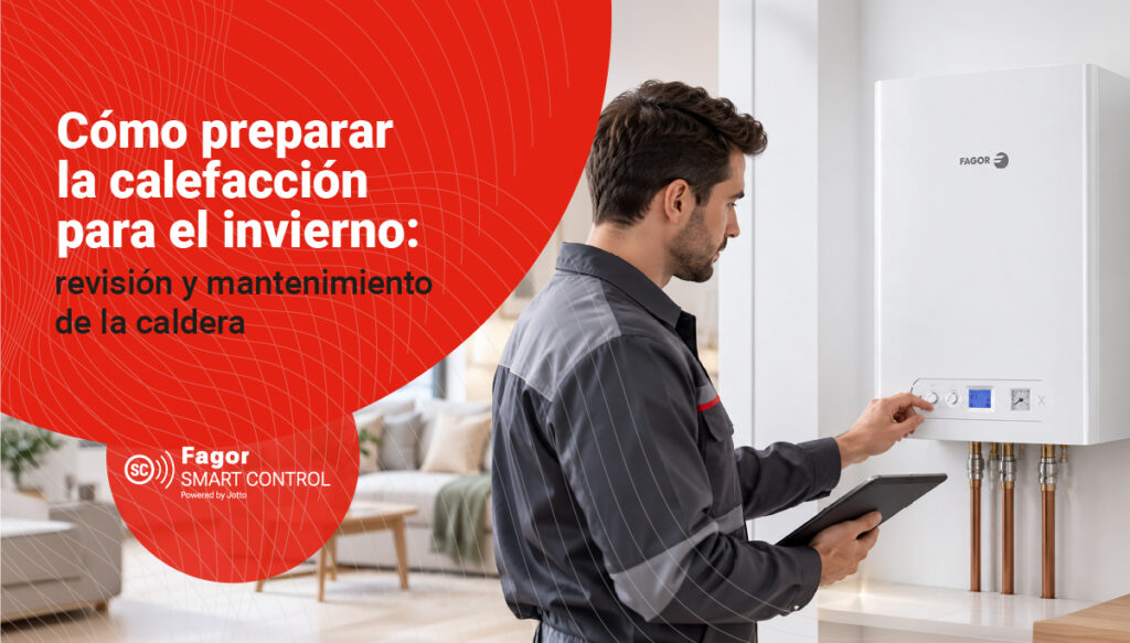 Técnico revisando una caldera de gas Fagor antes del invierno con tablet en mano